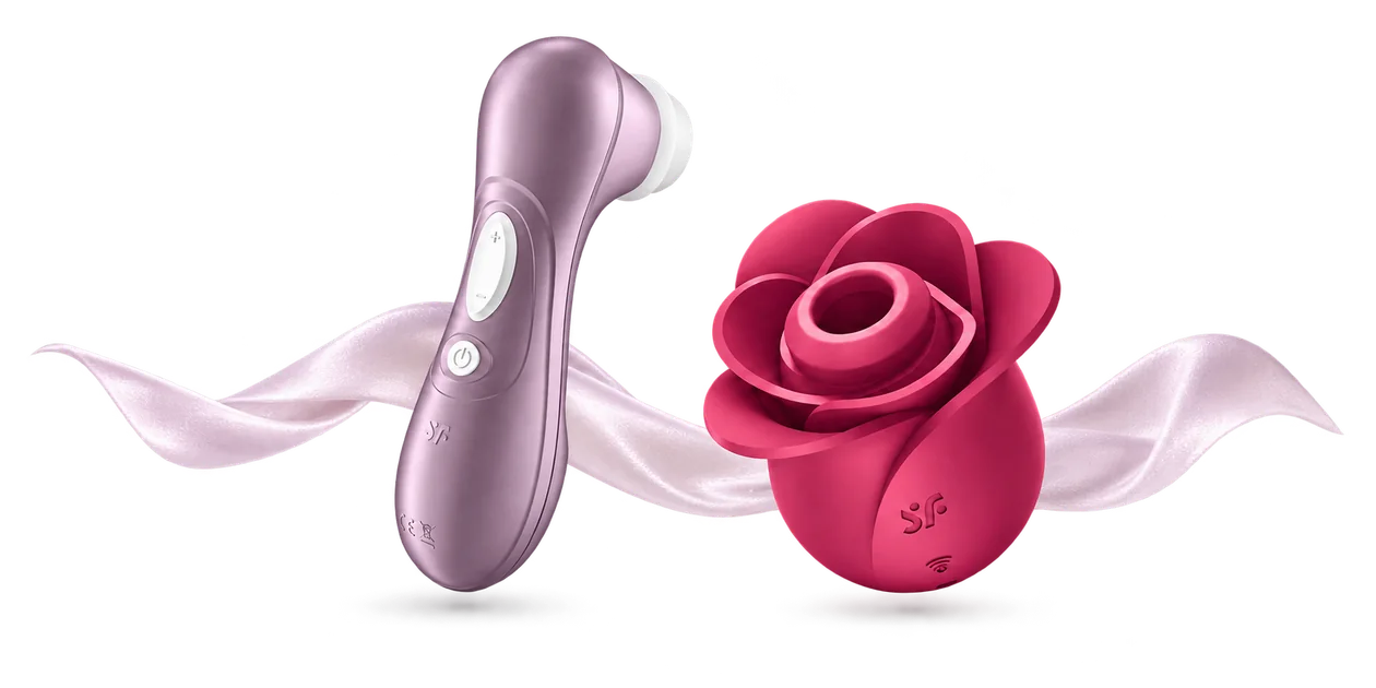 Satisfyer Pro 2 in Lila und Satisfyer Blossom mit einem weichen Satinband